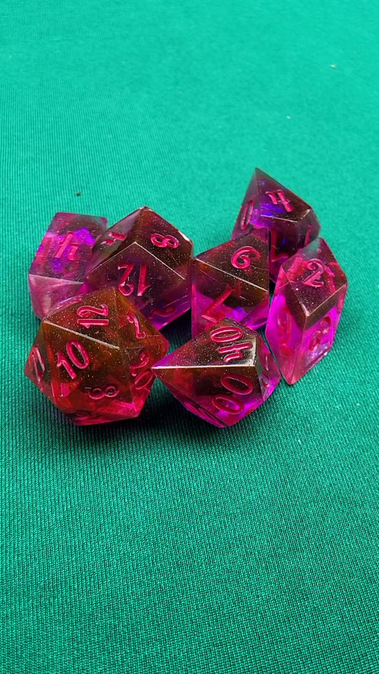 The Crystal Calls 7 piece resin ttrpg dice set